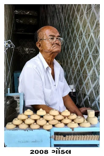 The supplied 2008 Gondal photograph of an elderly gentleman seated behind a display of sweets
